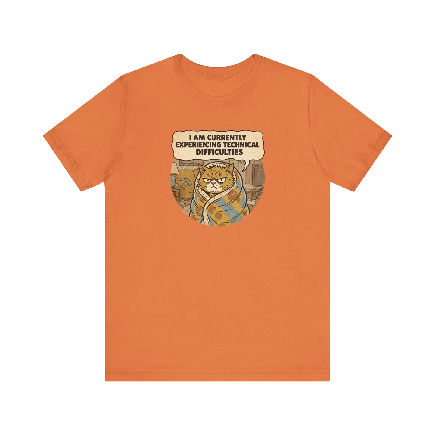 Orange t-shirt with a cartoon cat wrapped in a blanket saying "I am currently experiencing technical difficulties."