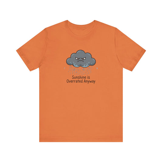 Orange t-shirt with a frowning cloud raining and text "Sunshine is Overrated Anyway".