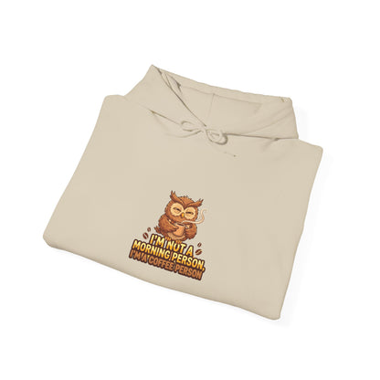 Cream hoodie with owl graphic and text "I'M NOT A MORNING PERSON. I'M A COFFEE PERSON."
