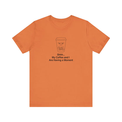 Orange t-shirt with a steaming coffee cup graphic and "Shhh... My Having a Moment" text.