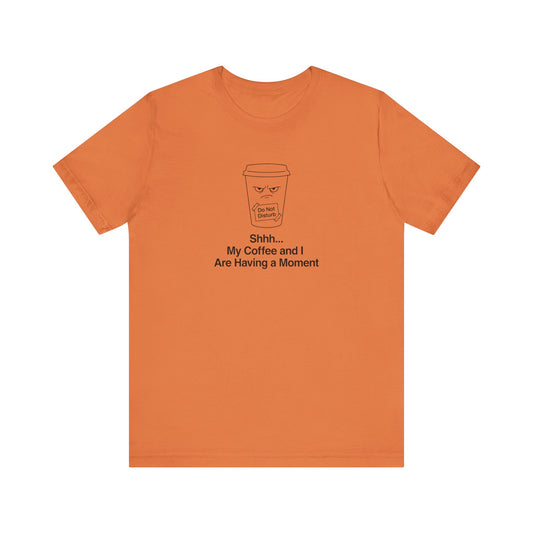 Orange t-shirt with a steaming coffee cup graphic and "Shhh... My Having a Moment" text.