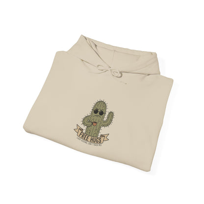 Beige hoodie with cartoon cactus wearing sunglasses, text "FREE HUGS".