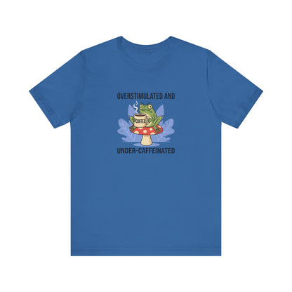 Blue t-shirt with a cartoon frog on a mushroom, holding a coffee cup.