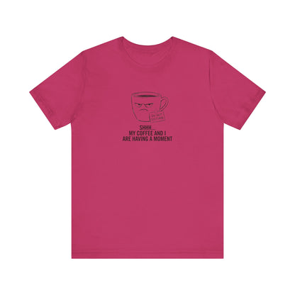 Magenta t-shirt with a graphic of a steaming coffee cup saying "DO NOT DISTURB SHHH... MY COFFEE AND I ARE HAVING A MOMENT".