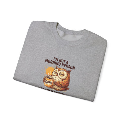 Gray sweatshirt with a graphic of an owl holding a coffee cup and the text "I'M NOT A MORNING PERSON".