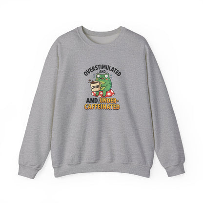 Gray sweatshirt with frog holding coffee cup and text "OVERSTIMULATED AND UNDER-CAFFEINATED".