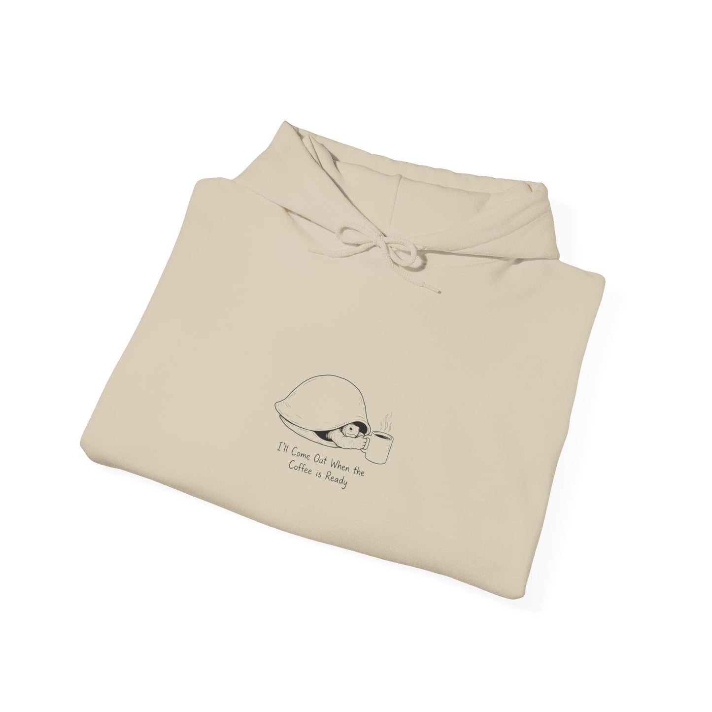 Cream hoodie with "I'll Come Out When The Coffee Is Ready" text and illustration.