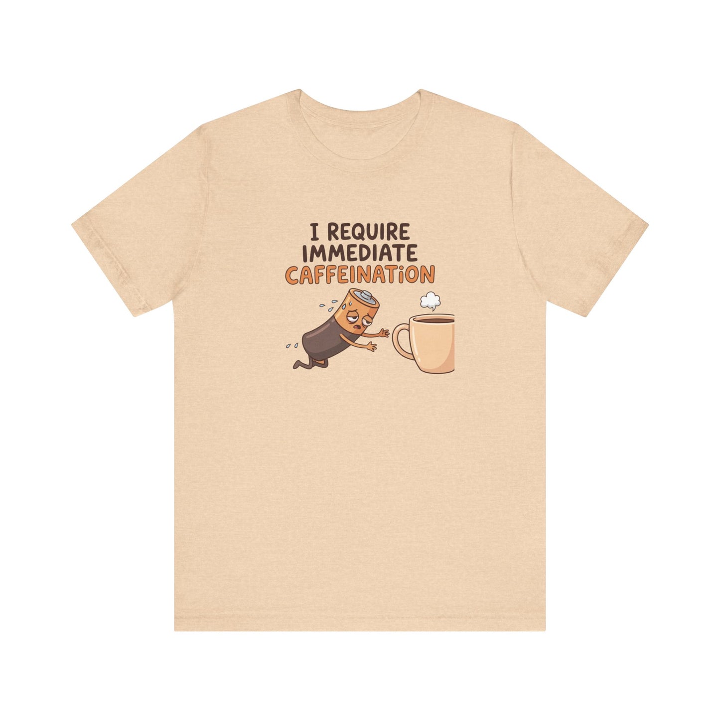 T-shirt with cartoon battery reaching for coffee cup, text "I REQUIRE IMMEDIATE CAFFEINATION".