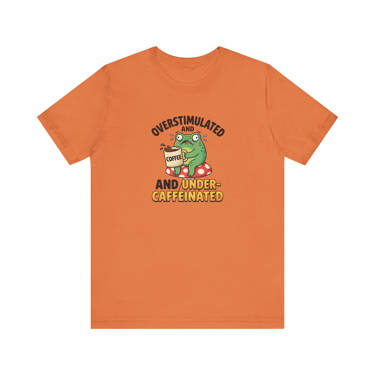 Orange t-shirt with graphic of an overstimulated, caffeinated frog holding coffee.