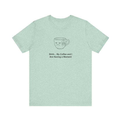 Mint green t-shirt with a grumpy coffee cup graphic and text.