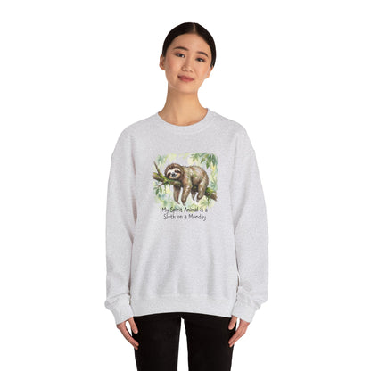 Light grey sweatshirt with a watercolor sloth on a branch and text that reads "My Spirit Animal is a Sloth on a Monday".