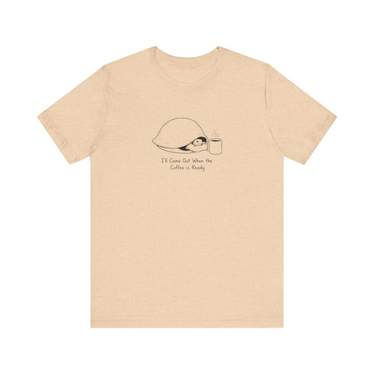 T-shirt with a drawing of a turtle and coffee cup, text "I'll Come Out When the Coffee is Ready".