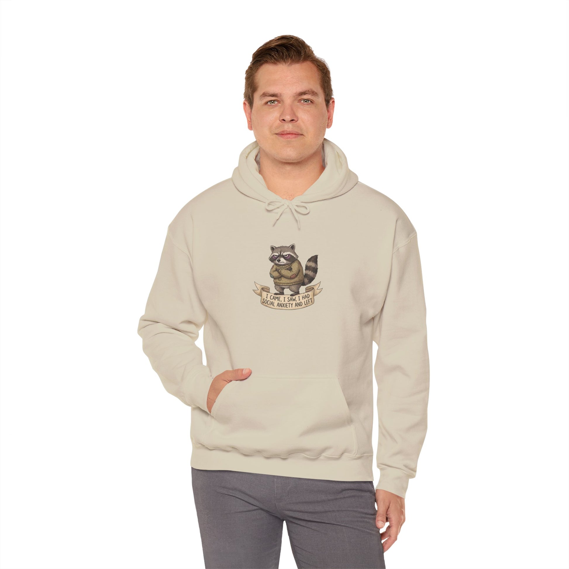 Cream hoodie with raccoon graphic and banner reading "I Have Social Anxiety".