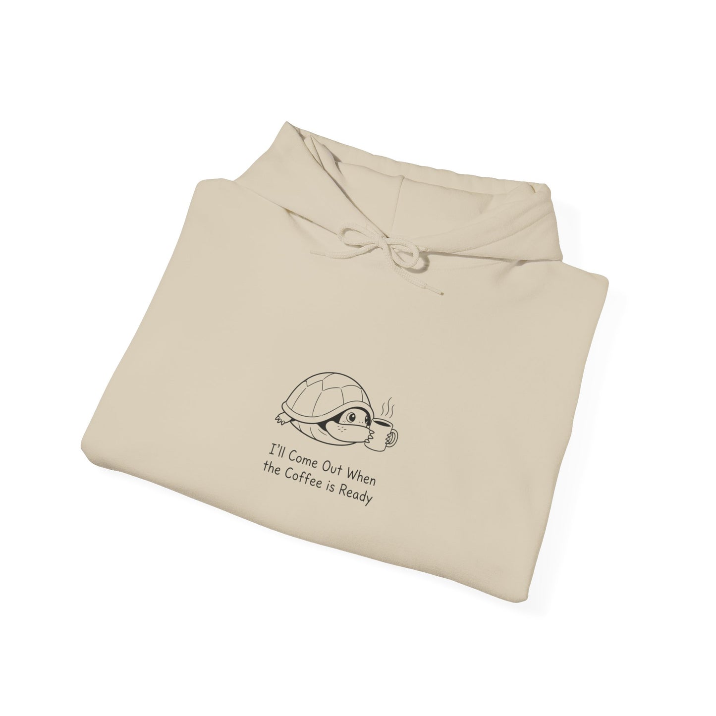 Beige hooded sweatshirt with black line drawing of a turtle holding a coffee mug.