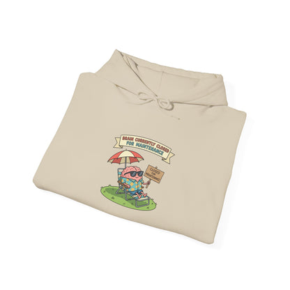 Beige hoodie with cartoon brain on beach vacation wearing sunglasses and holding a drink.