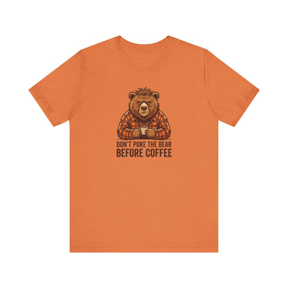 Orange t-shirt with a bear wearing a plaid shirt holding a coffee cup.