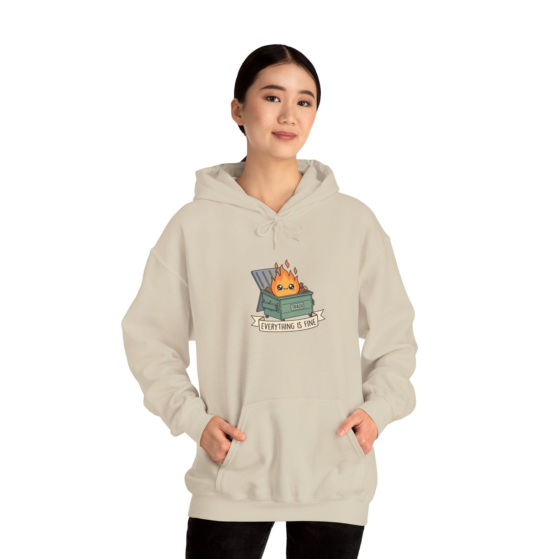 Cream hoodie with cartoon trash can on fire and text "EVERYTHING IS FINE."