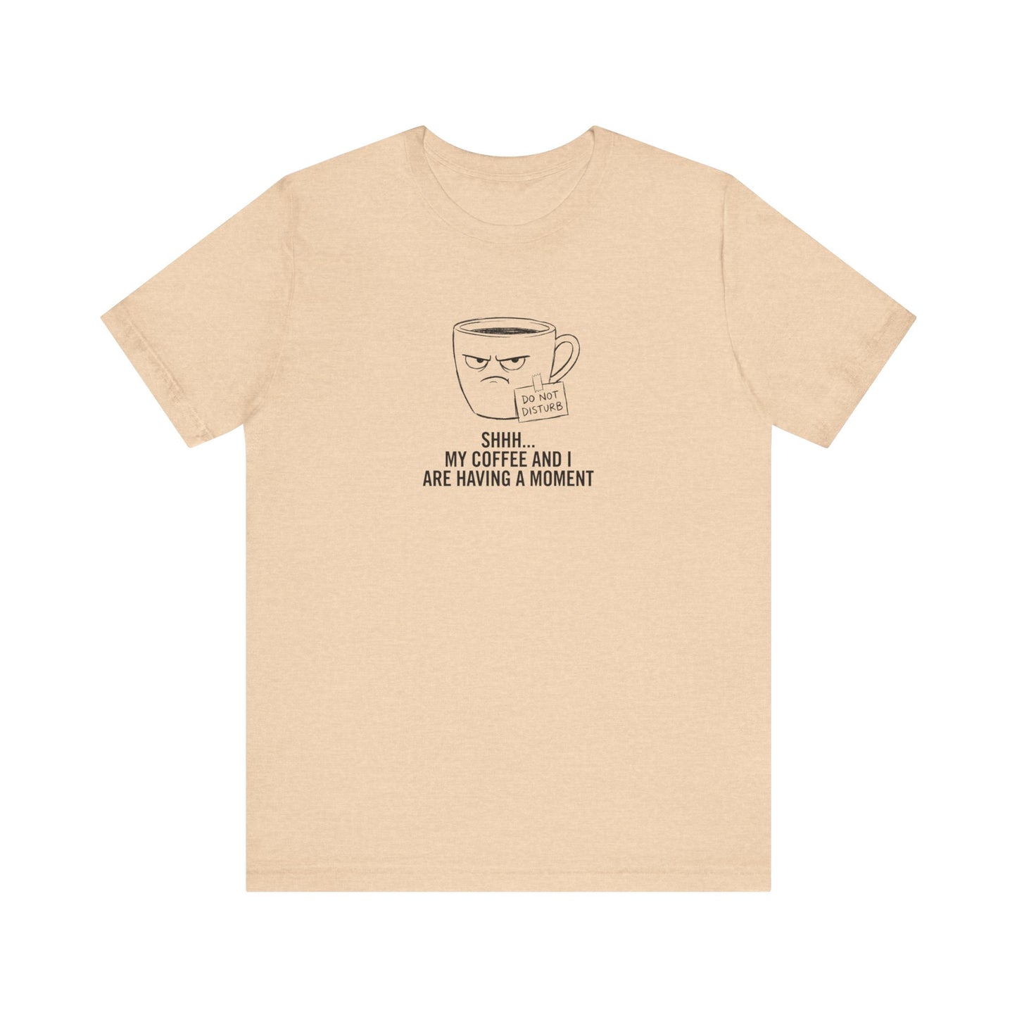 Light tan t-shirt with a grumpy coffee cup graphic and "DO NOT DISTURB SHHH... MY COFFEE AND I ARE HAVING A MOMENT" text.